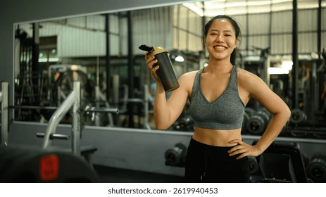 gym beginner preparing supplement powder shaker